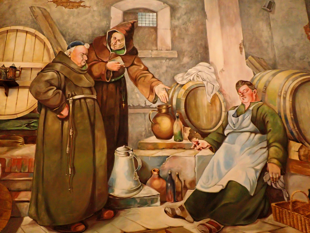 Piajni mnisi w obrazie na ścianach Piwiarni Weihensephan jako Muzeum Piwa w Kutaisi